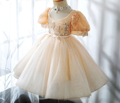 Introducing our enchanting Pleated Girls Dress from Hikmah Boutique, a perfect blend of style and charm. This delightful dress is designed to make your little princess feel like the belle of the ball. Whether she's attending a party, a wedding, or a special occasion, this dress will ensure she shines with elegance and grace.