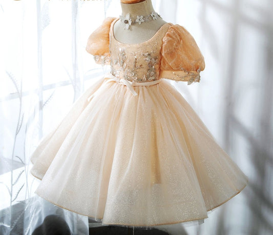 Introducing our enchanting Pleated Girls Dress from Hikmah Boutique, a perfect blend of style and charm. This delightful dress is designed to make your little princess feel like the belle of the ball. Whether she's attending a party, a wedding, or a special occasion, this dress will ensure she shines with elegance and grace.