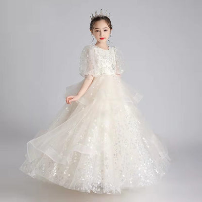 Introducing our exquisite Royal Girls Dress from Hikmah Boutique, designed to make your little princess feel like royalty. Crafted with attention to detail and featuring luxurious fabrics, 5 layers of chiffon and mesh skirt, this dress is perfect for special occasions, weddings, or any event where she wants to stand out. 