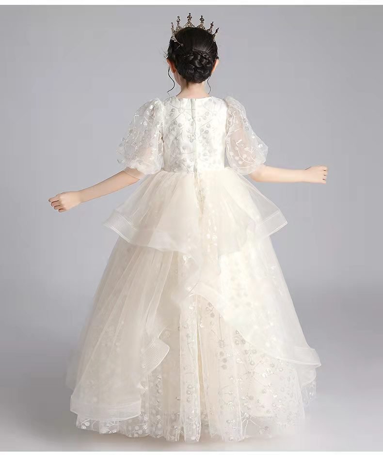 Introducing our exquisite Royal Girls Dress from Hikmah Boutique, designed to make your little princess feel like royalty. Crafted with attention to detail and featuring luxurious fabrics, 5 layers of chiffon and mesh skirt, this dress is perfect for special occasions, weddings, or any event where she wants to stand out. 